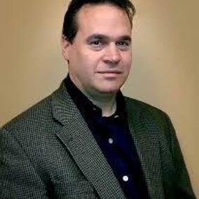 Dr Armond Levy
